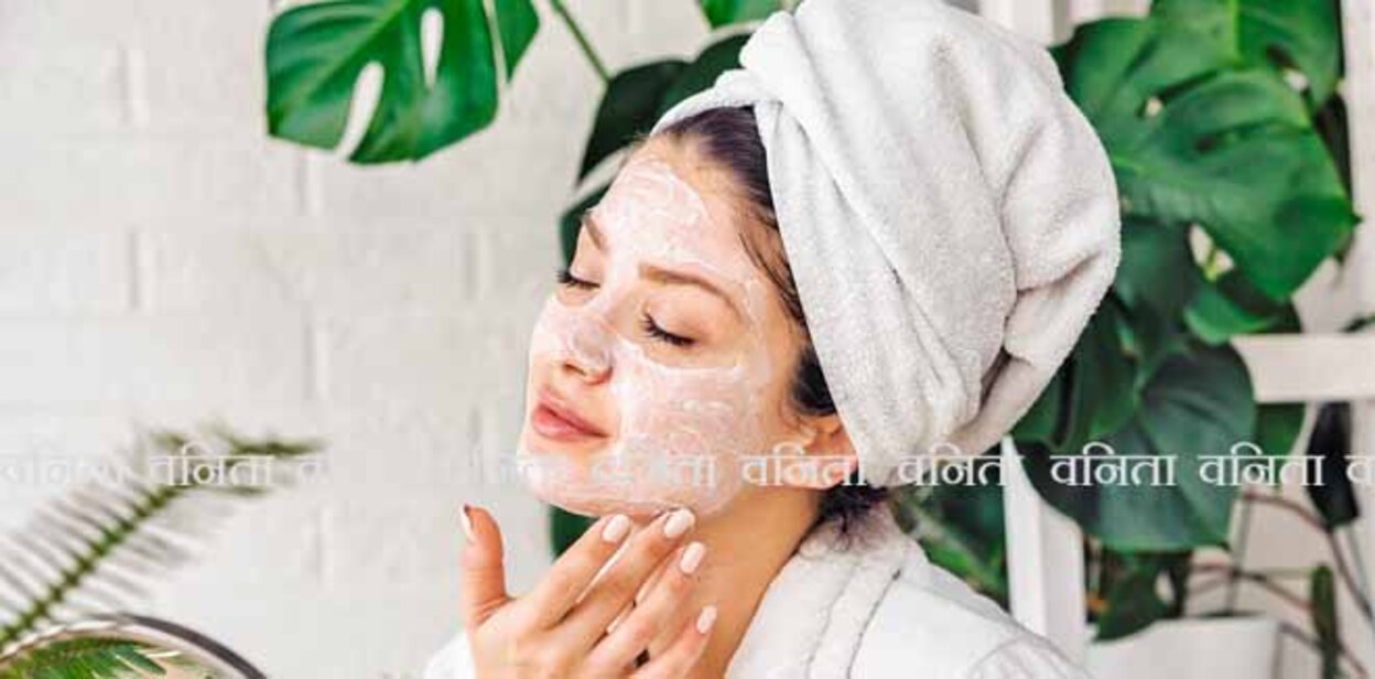 Young woman applying face mask at home. Natural Skin Care Routine For Glowing Skin.