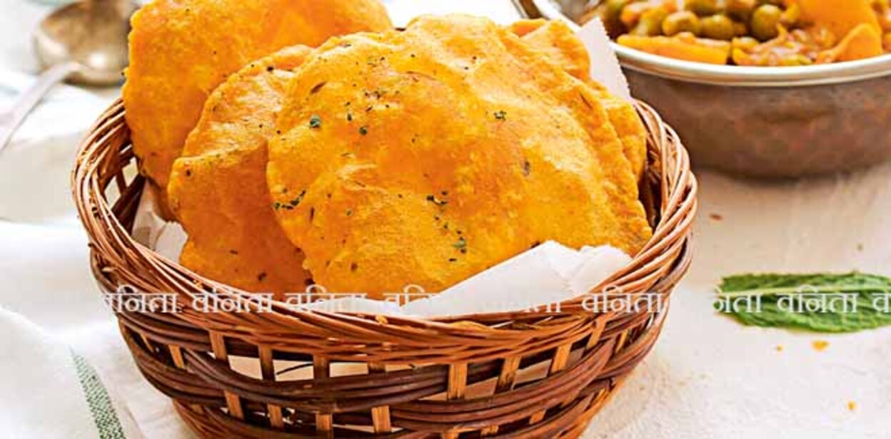 Homemade Indian Potato Poori or Puri served with Alu Matar, selective focus