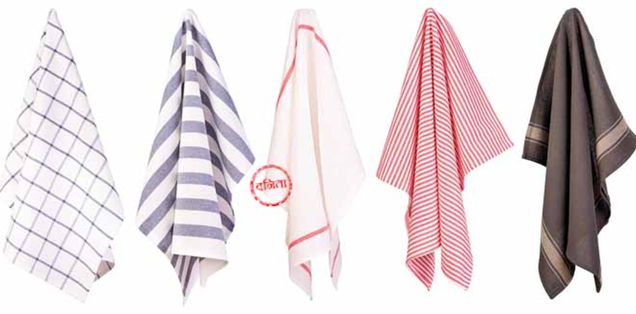 Hanging kitchen towels isolated on white background	