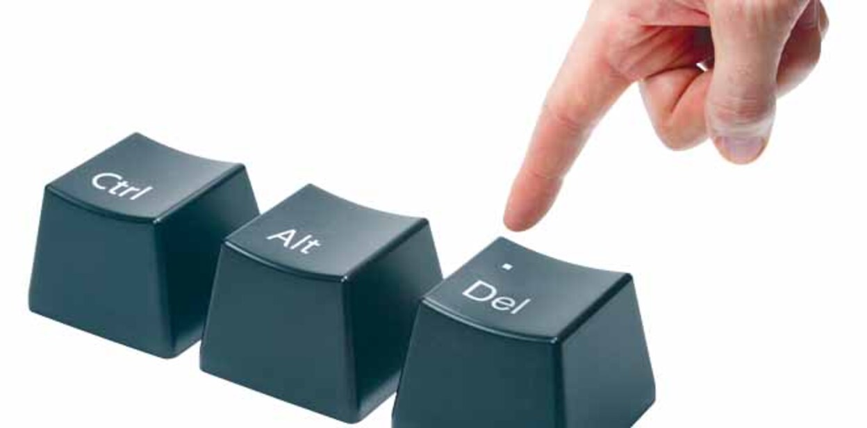 hand with index finger pokes push the delete key, button alt, ctrl