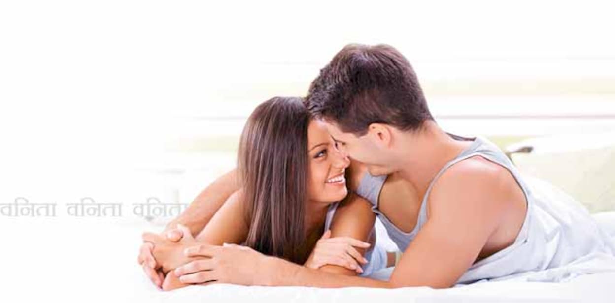 Young love couple in bed, romantic scene in bedroom