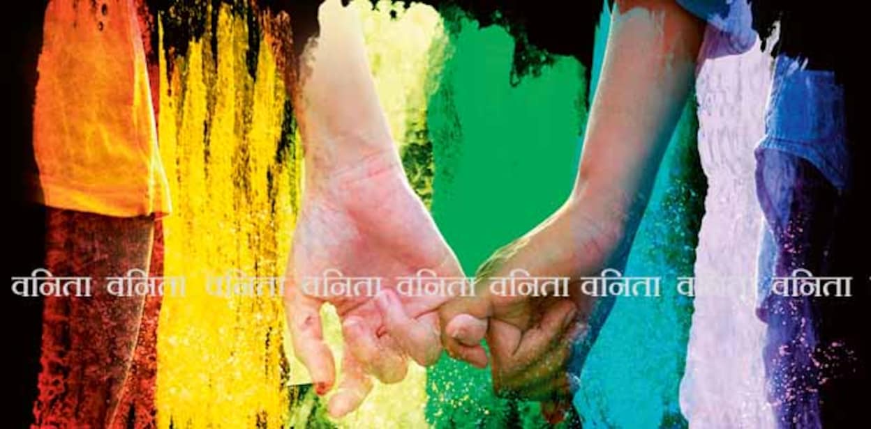 Close up couple women 's hands hook little finger together overlay with abstract painting rainbow color on black color background ,LGBT concept. 