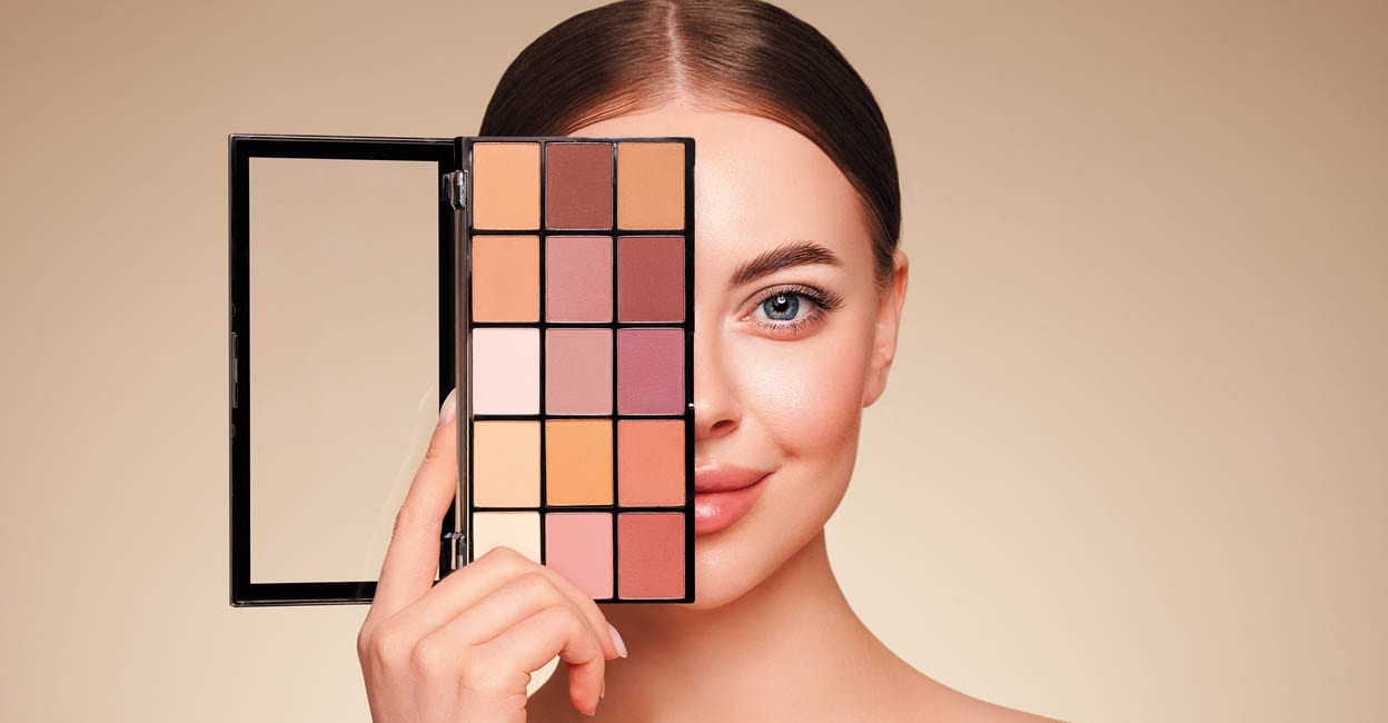 Beauty woman with eye shadow makeup palette. Model with healthy perfect skin, close up portrait. Cosmetology, beauty and spa