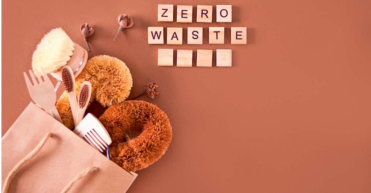 zero waste cleaning, plastic free eco natural coconut brushes for washing dishes, comb, toothbrush, glass straws, eco friendly flat lay