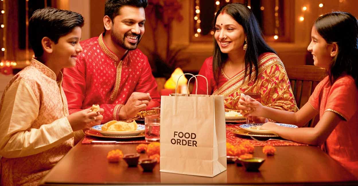 happy indian rich family eating dinner on table, with food order bag in top of the table,  diwali festival celebration, festival lights, father mother and two kids